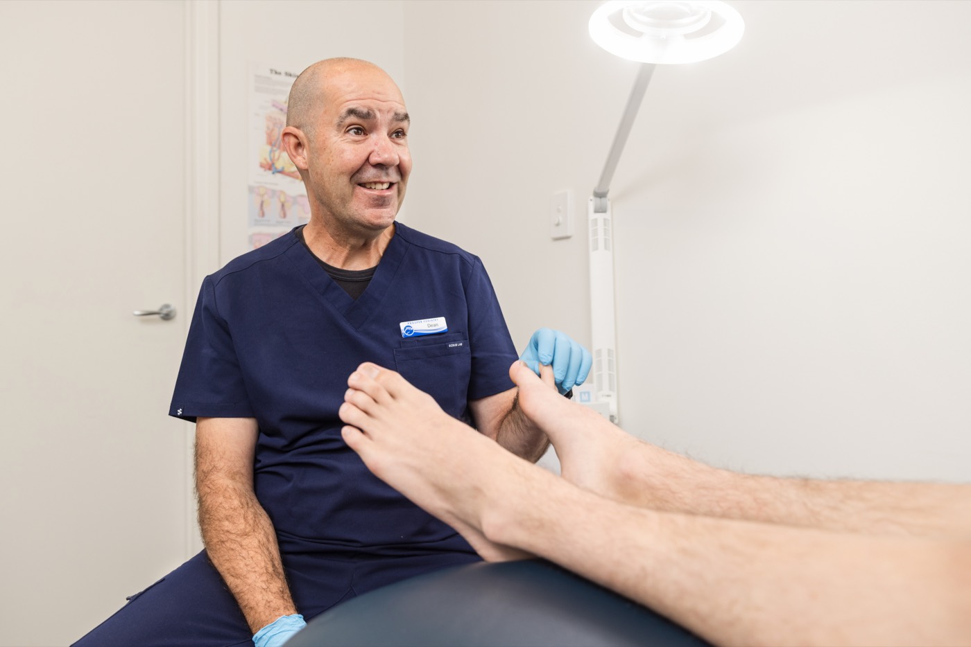 Clinician consulting with a patient